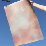 fond photo vaporeux rose et beige effet nuage pour photographie de produit artistique ou poétique.